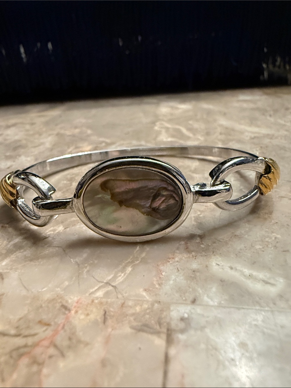Vintage 1970s Avon, silver and gold tone clip cuff bracelet with abalone shell